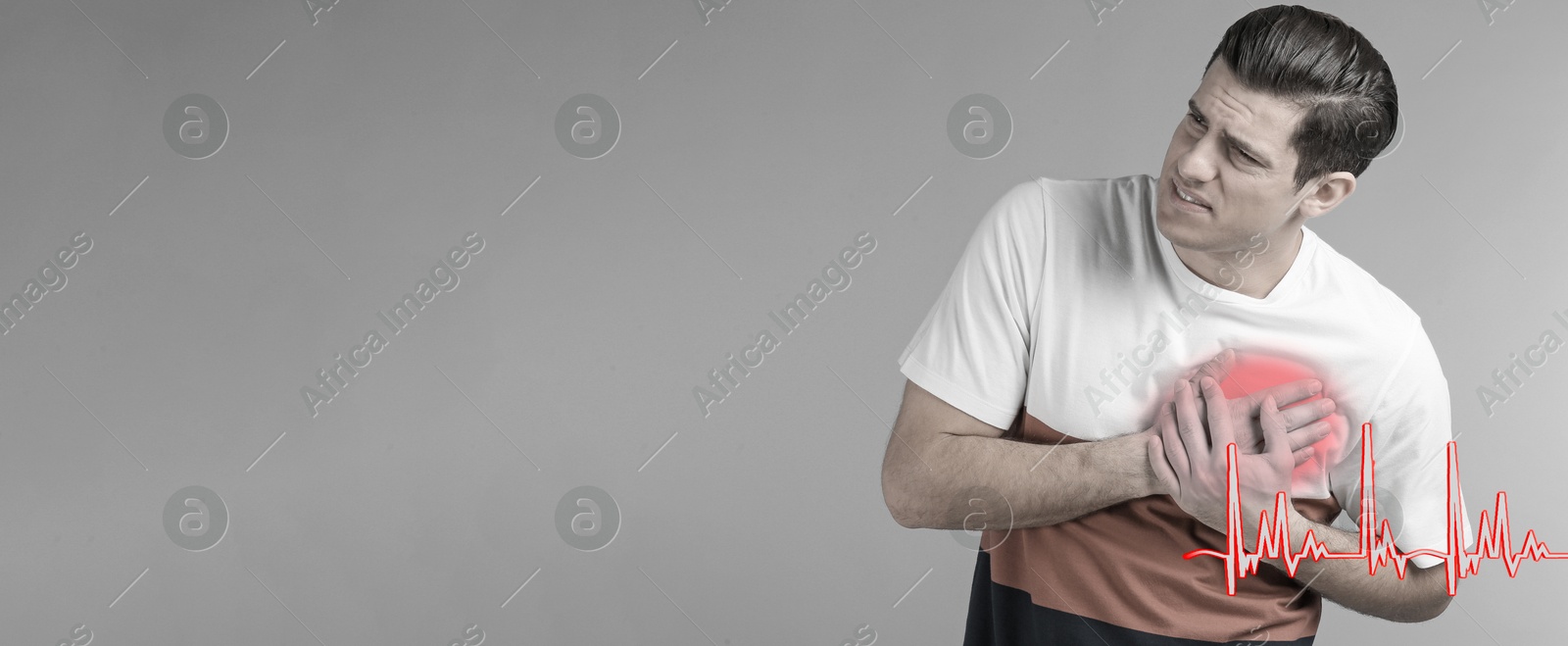 Image of Heart attack. Man writhing in pain and pressing hands to chest on light grey background. Banner design with space for text