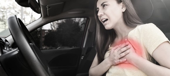 Image of Heart attack. Young woman suffering from pain and pressing hands to chest in car. Banner design