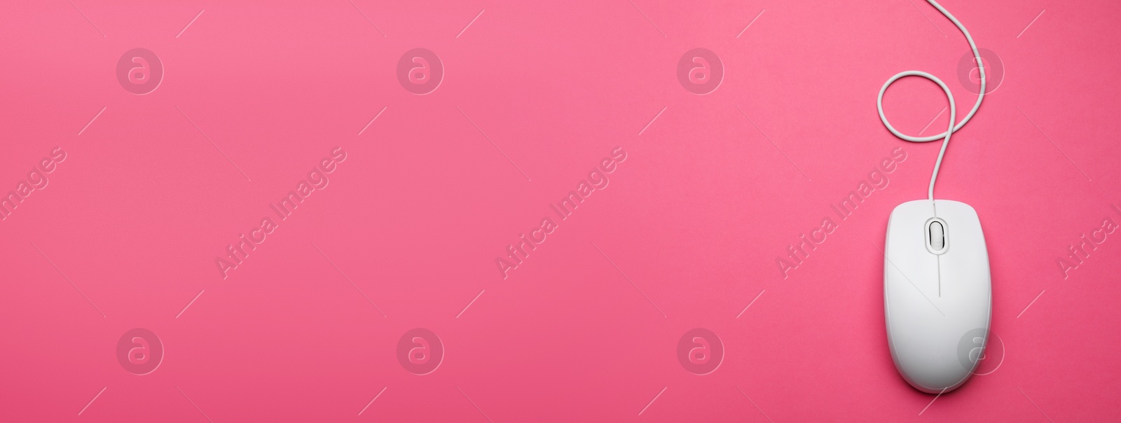 Image of Computer mouse on pink background, top view. Banner design with space for text