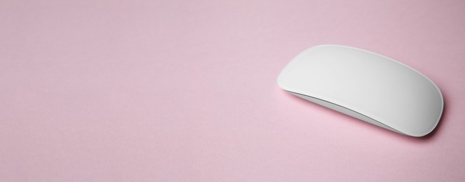 Computer mouse on pink background. Banner design with space for text