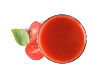 Photo of Tasty tomato juice in glass, basil and fresh vegetable isolated on white, top view