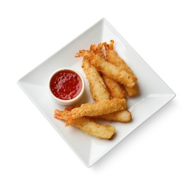 Tasty breaded fried shrimps and sauce isolated on white, top view