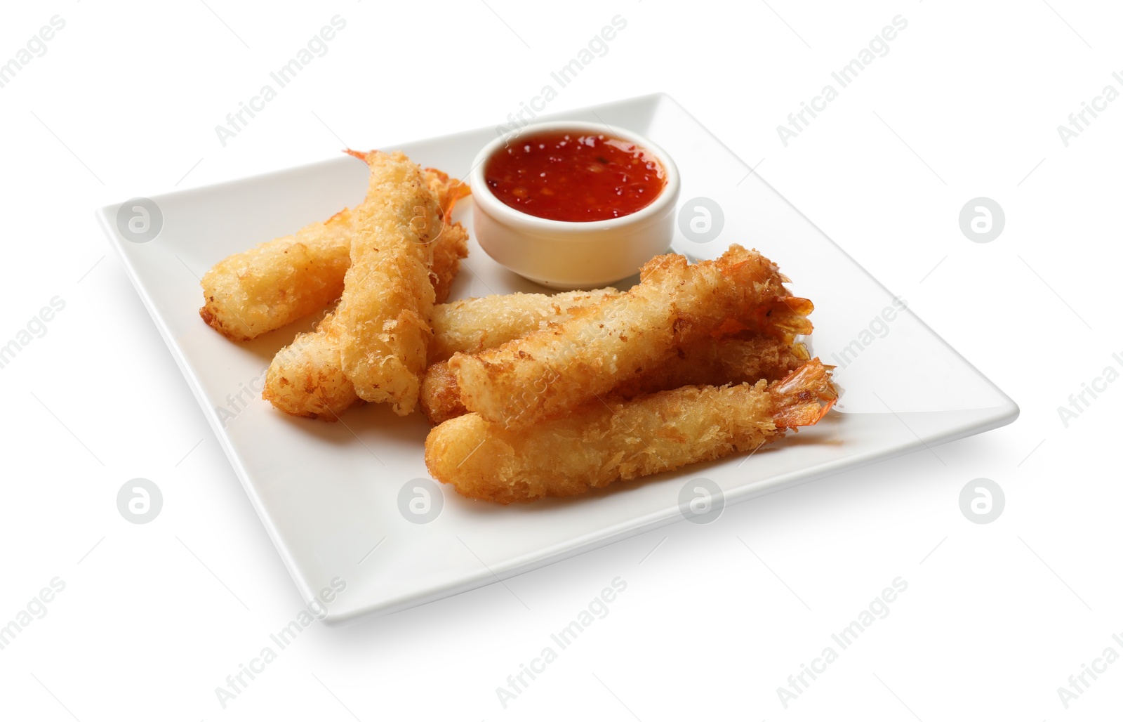 Photo of Tasty breaded fried shrimps and sauce isolated on white