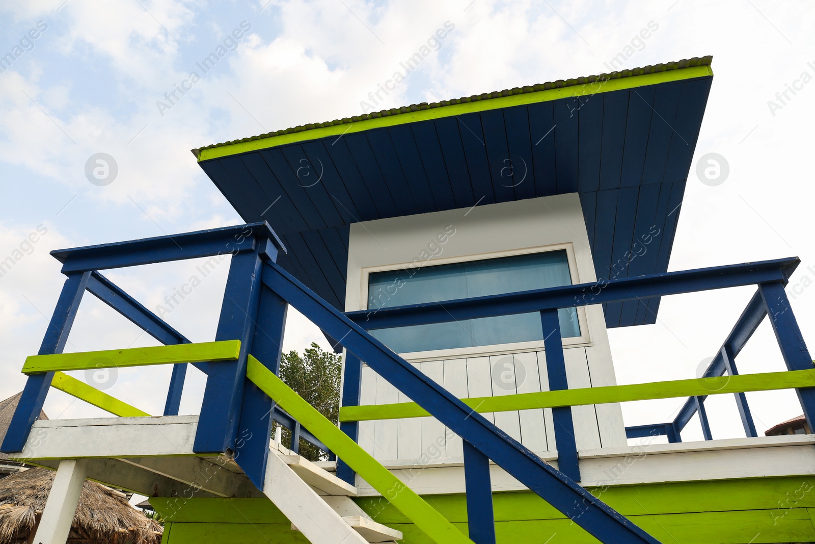 Photo of Empty wooden watch tower against blue sky on sunny day