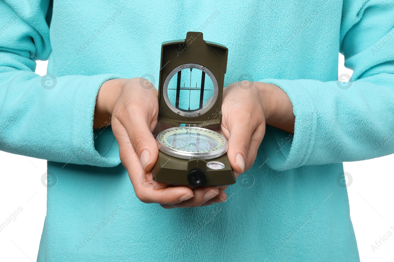 Photo of Woman holding compass on white background, closeup