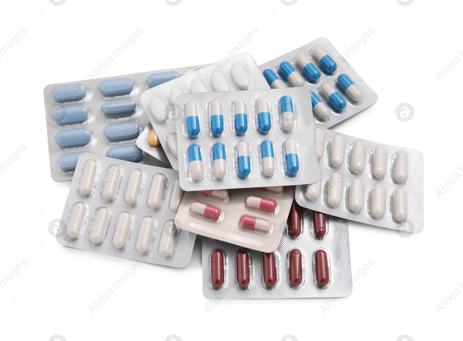 Photo of Different antibiotic pills in blisters isolated on white