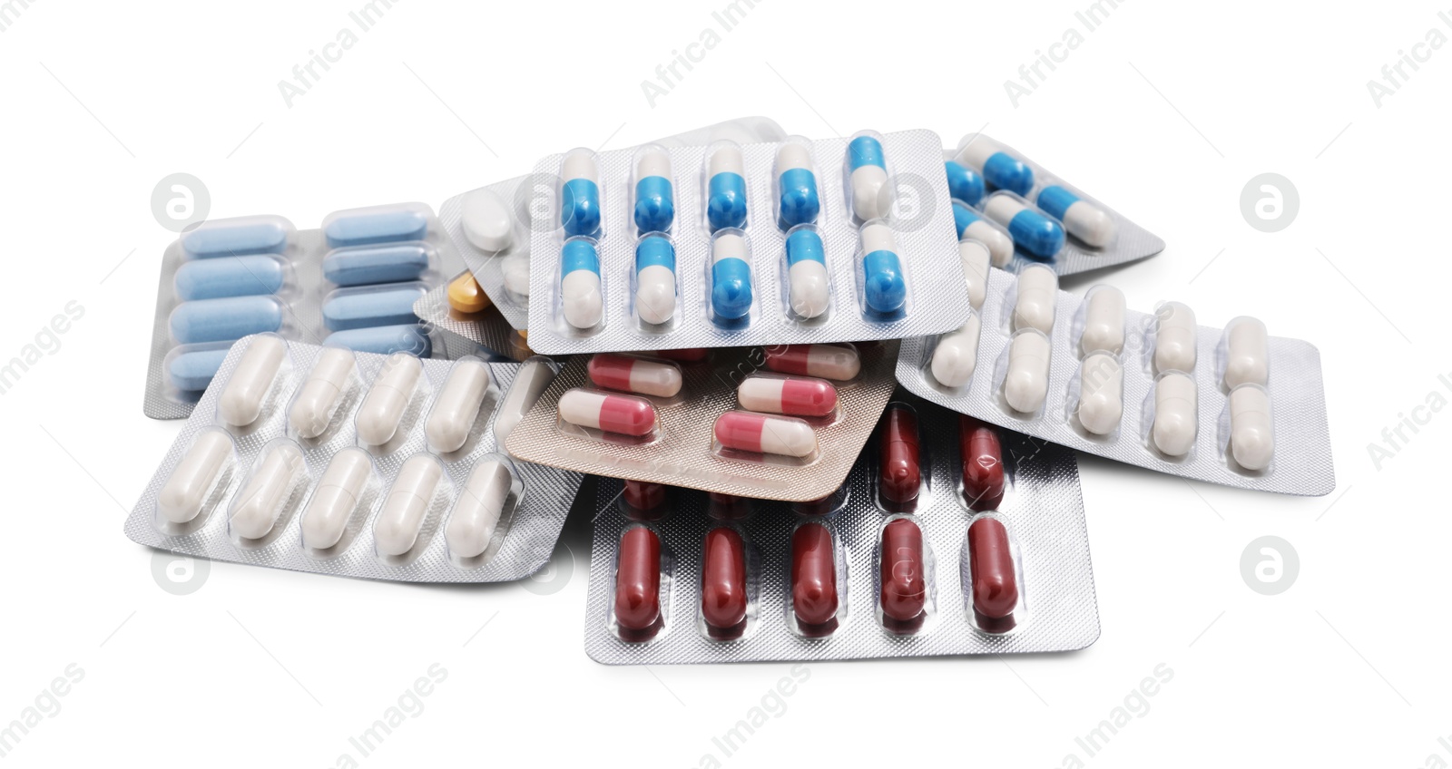 Photo of Different antibiotic pills in blisters isolated on white