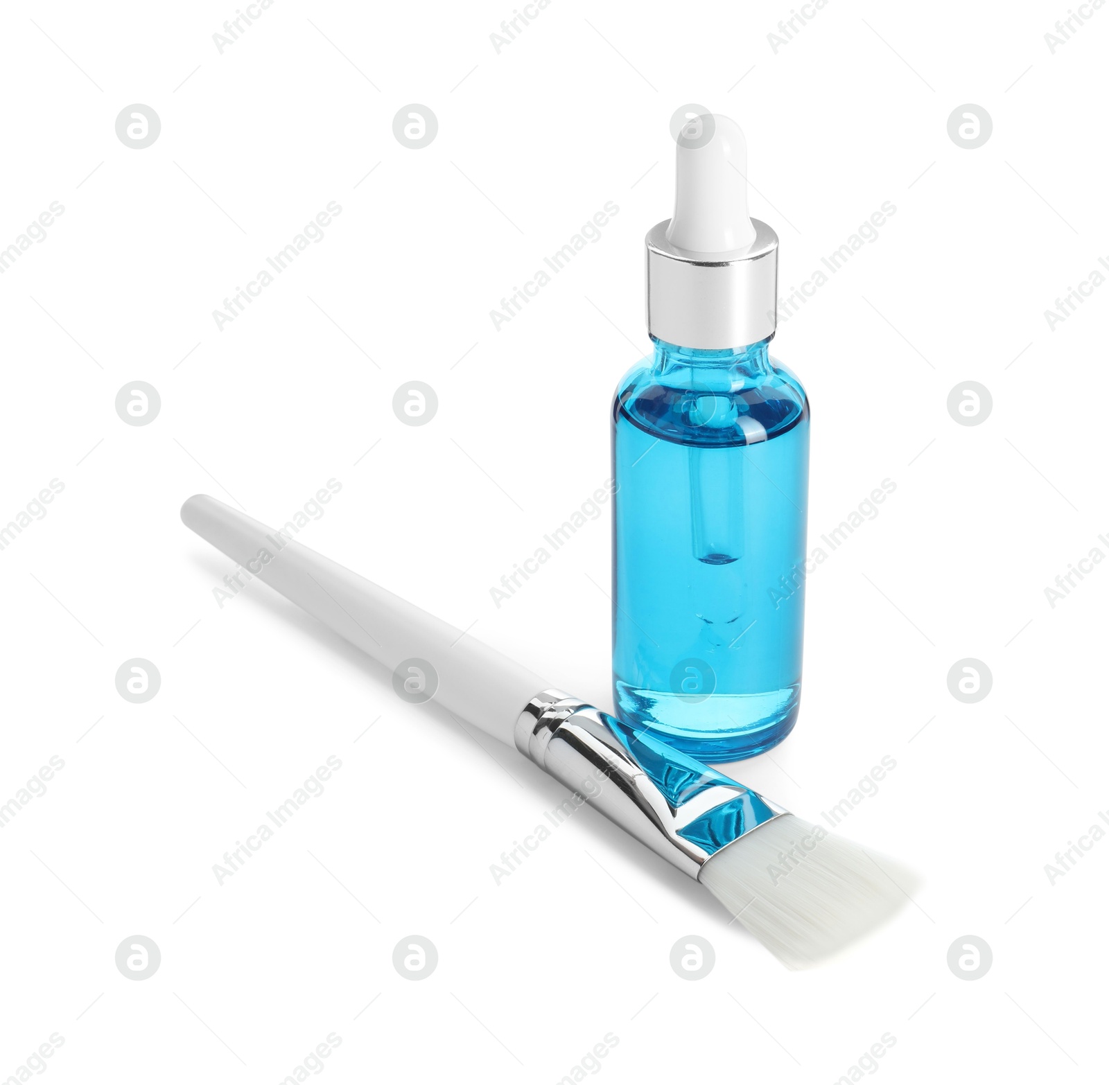 Photo of Bottle of chemical peel and brush isolated on white. Peeling procedure