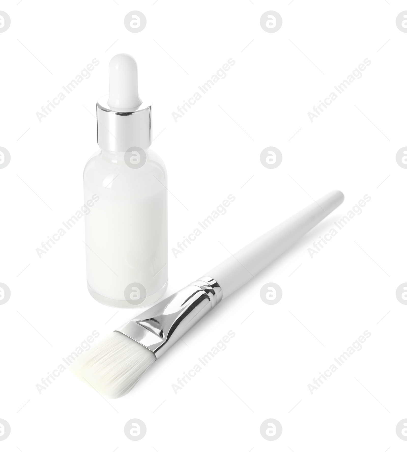 Photo of Bottle of chemical peel and brush isolated on white. Peeling procedure