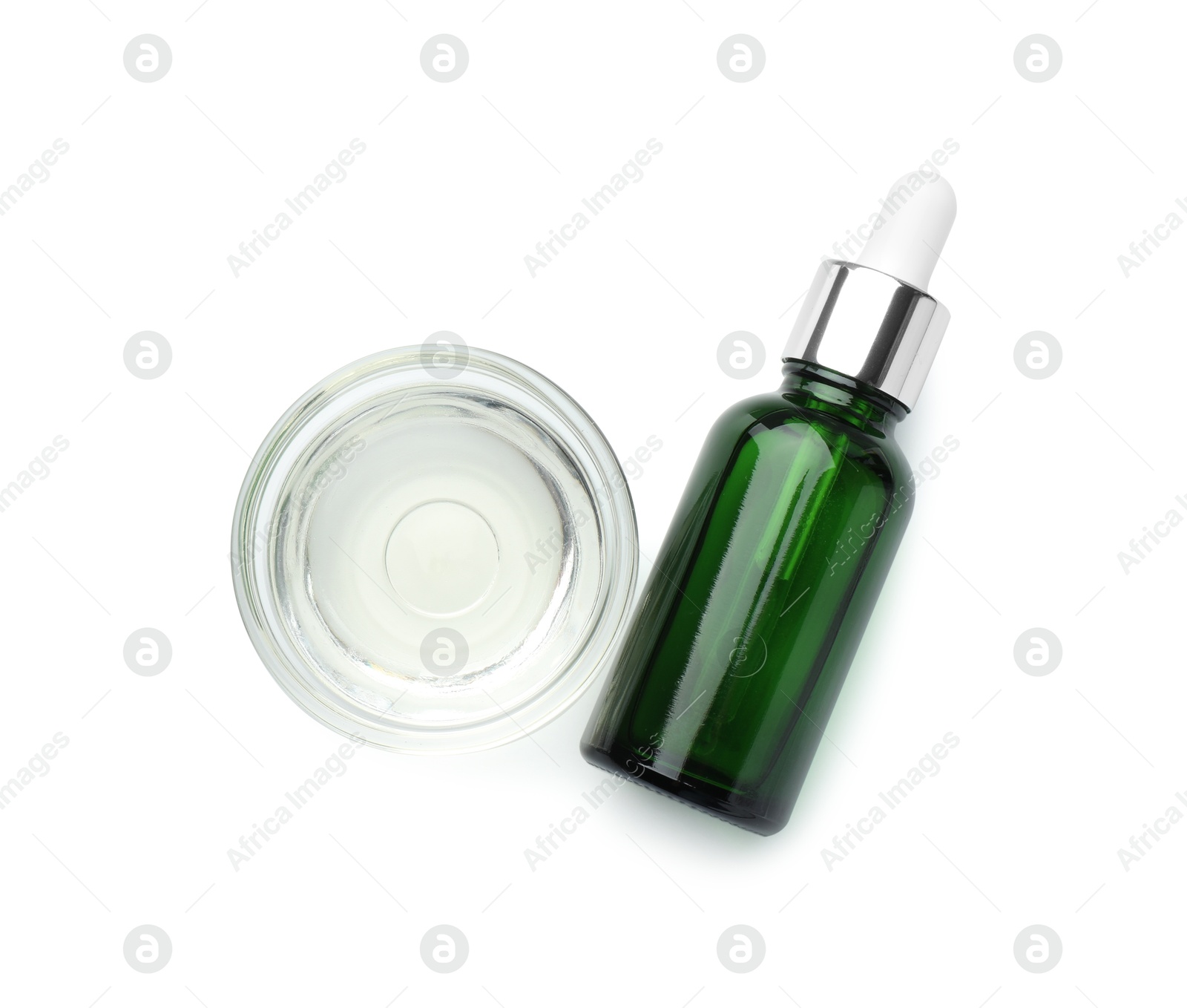 Photo of Bottle of chemical peel and bowl with liquid isolated on white, top view. Peeling procedure