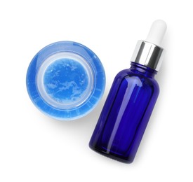 Bottle and bowl of chemical peel isolated on white, top view. Peeling procedure