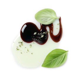 Photo of Delicious balsamic vinegar with olive oil, basil and herbs isolated on white, top view