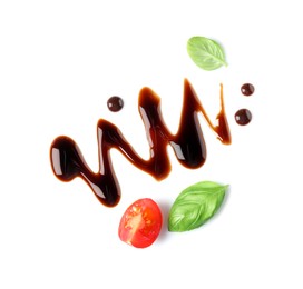 Delicious balsamic vinegar, cut tomato and basil isolated on white, top view