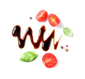 Photo of Delicious balsamic vinegar, cut tomato, basil and peppercorns isolated on white, top view