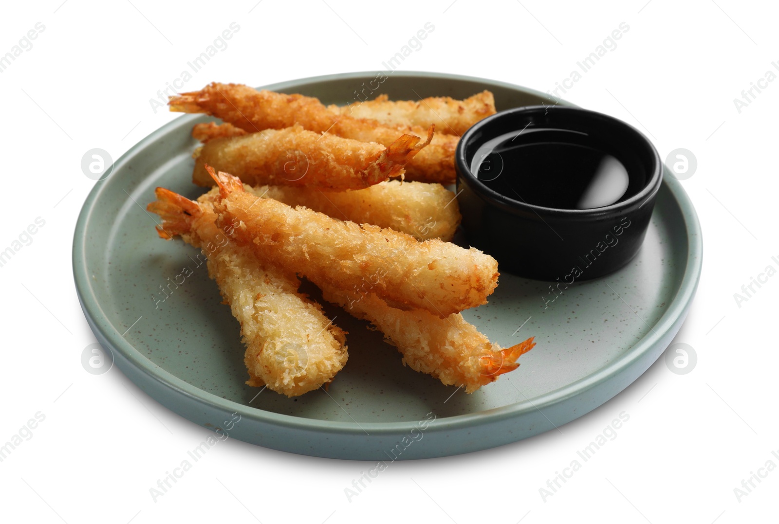 Photo of Tasty breaded fried shrimps and sauce isolated on white