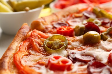 Photo of Delicious pizza Diablo on white table, closeup