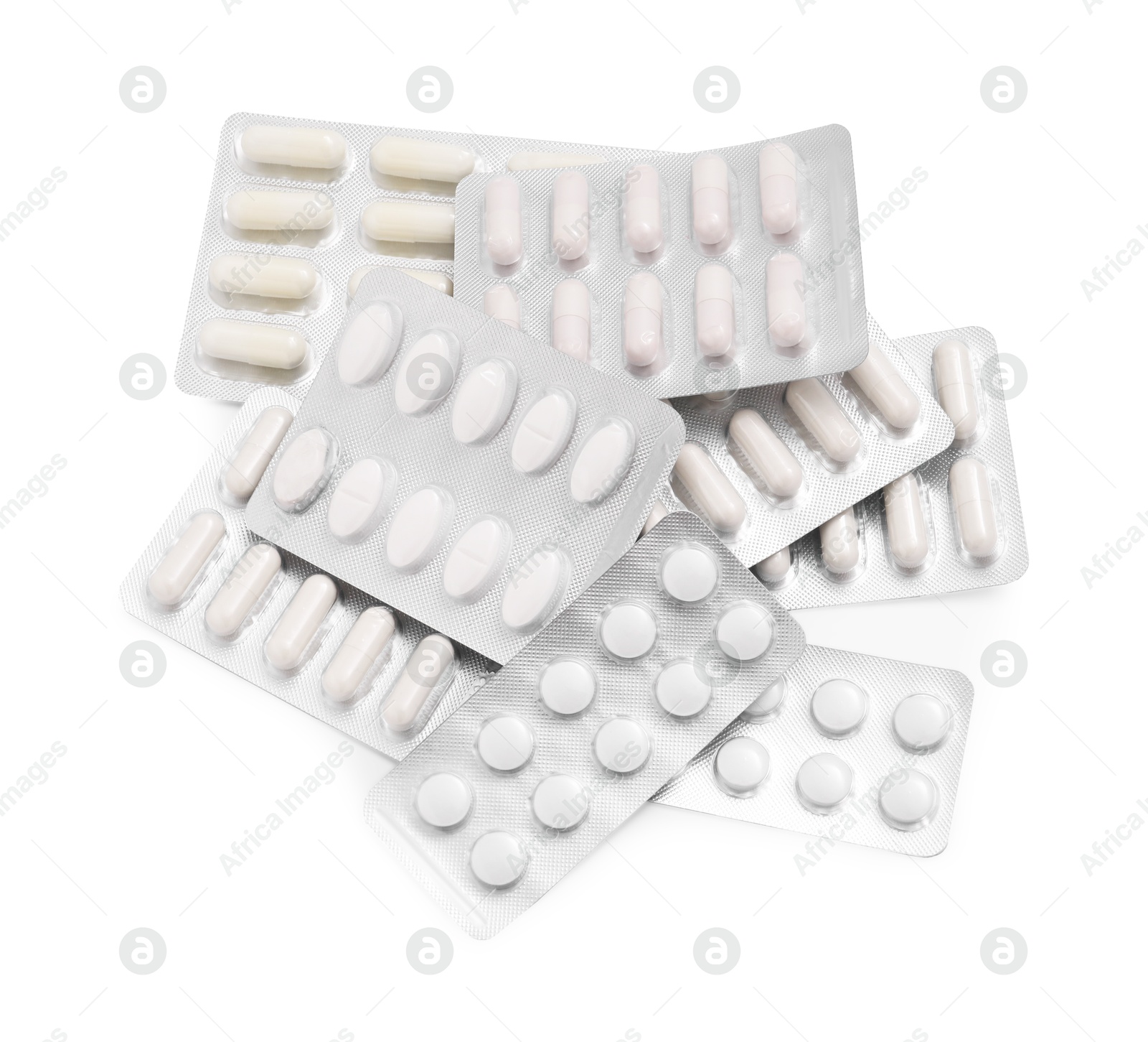 Photo of Different antibiotic pills in blisters isolated on white