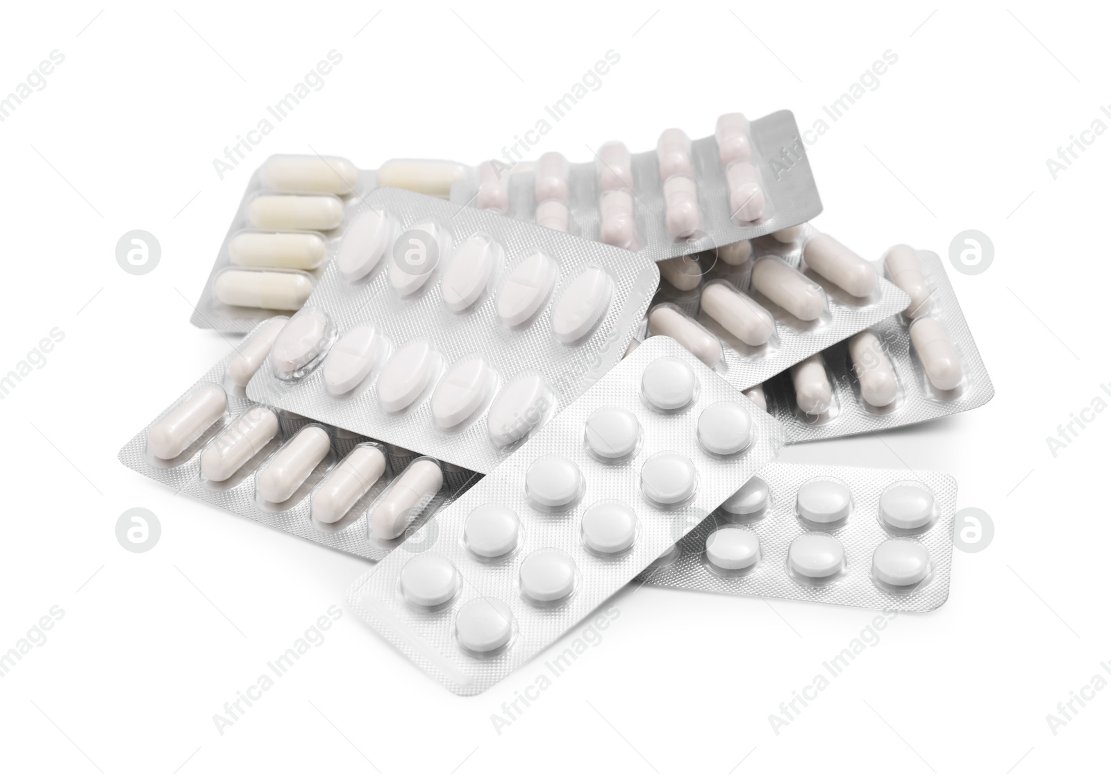 Photo of Different antibiotic pills in blisters isolated on white