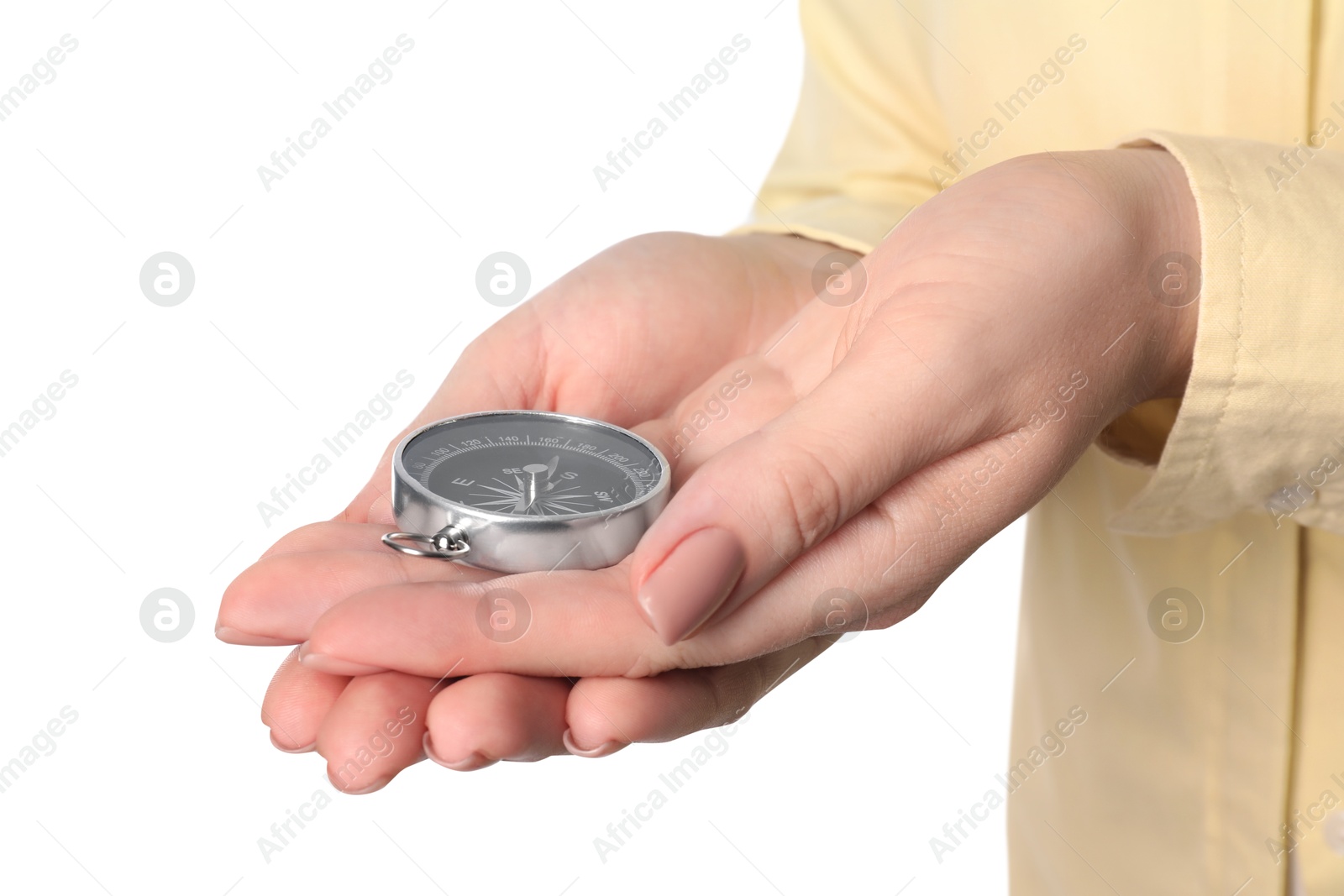 Photo of Woman holding compass on white background, closeup