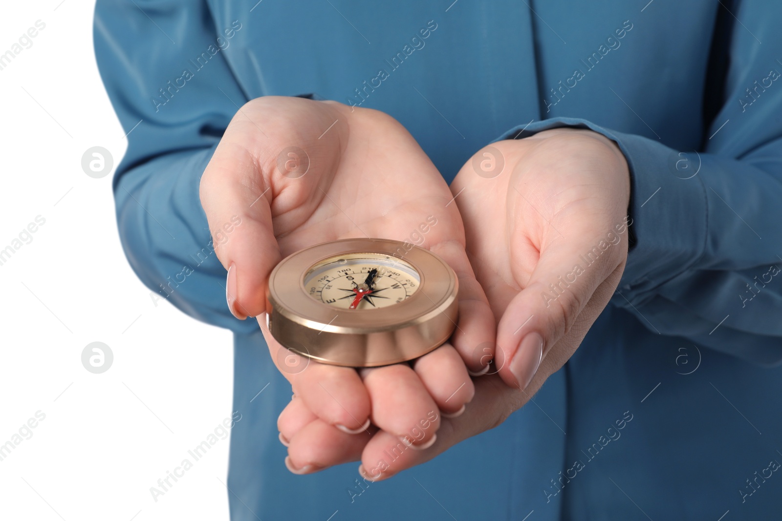 Photo of Woman holding compass on white background, closeup