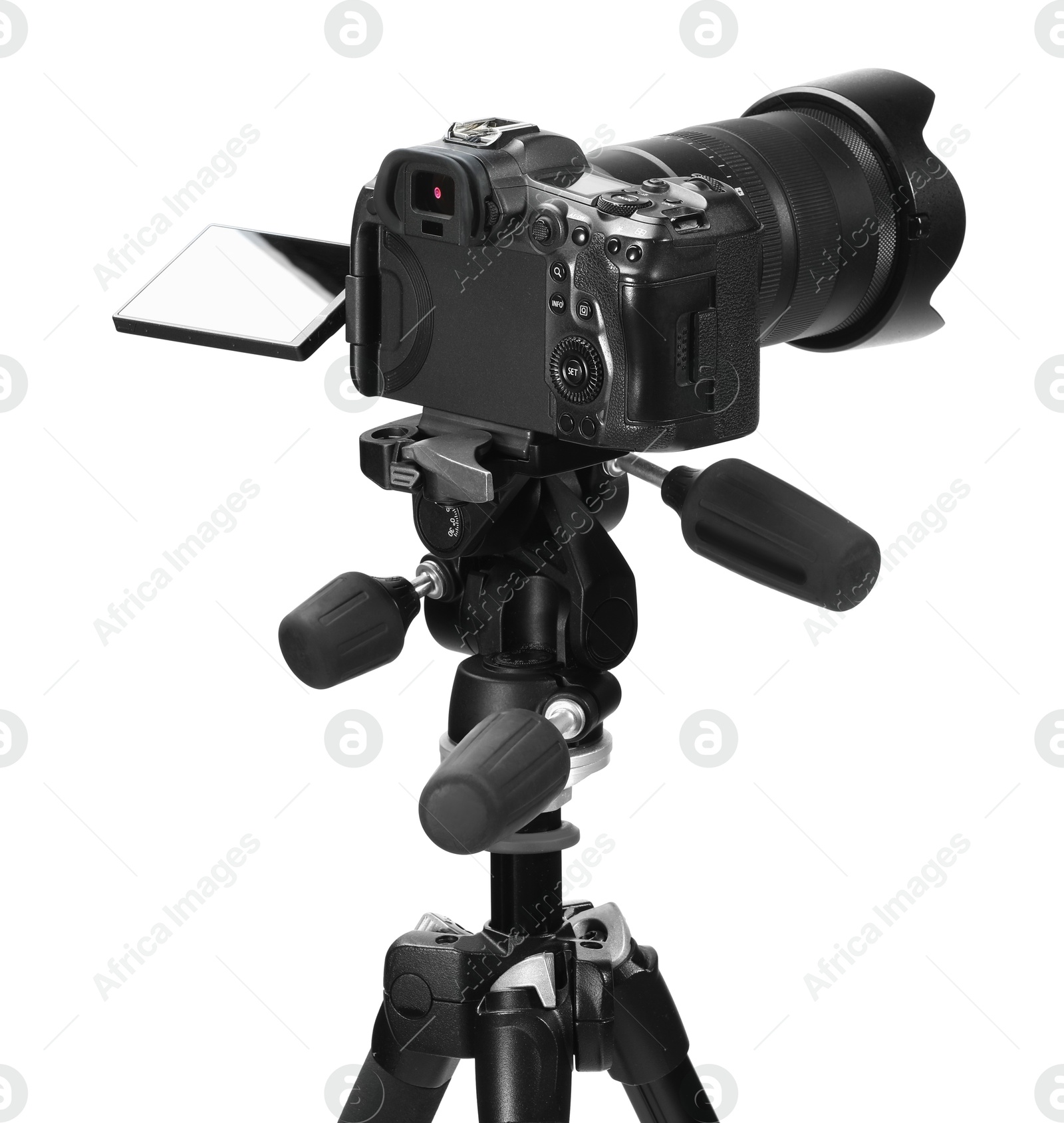 Photo of Modern camera with tripod isolated on white. Photographer's equipment