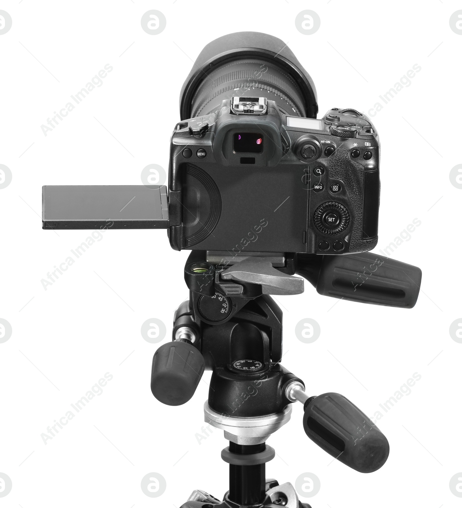 Photo of Modern camera with tripod isolated on white. Photographer's equipment