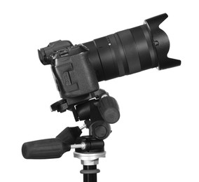 Photo of Modern camera with tripod isolated on white. Photographer's equipment