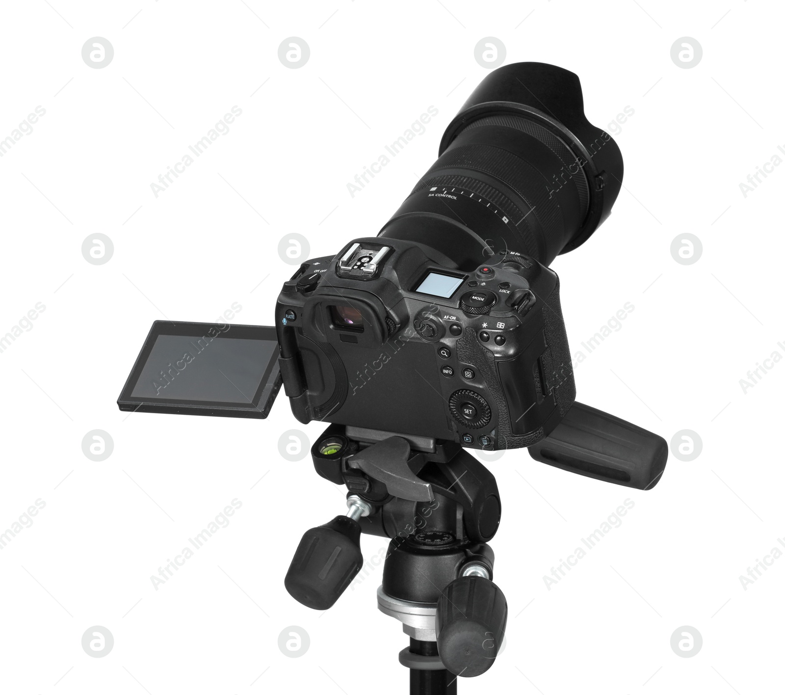 Photo of Modern camera with tripod isolated on white. Photographer's equipment