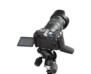 Photo of Modern camera with tripod isolated on white. Photographer's equipment