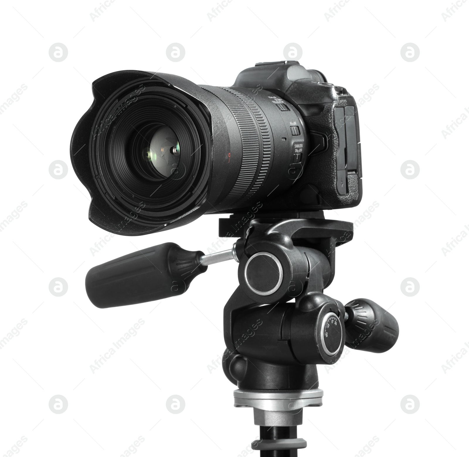 Photo of Modern camera with tripod isolated on white. Photographer's equipment