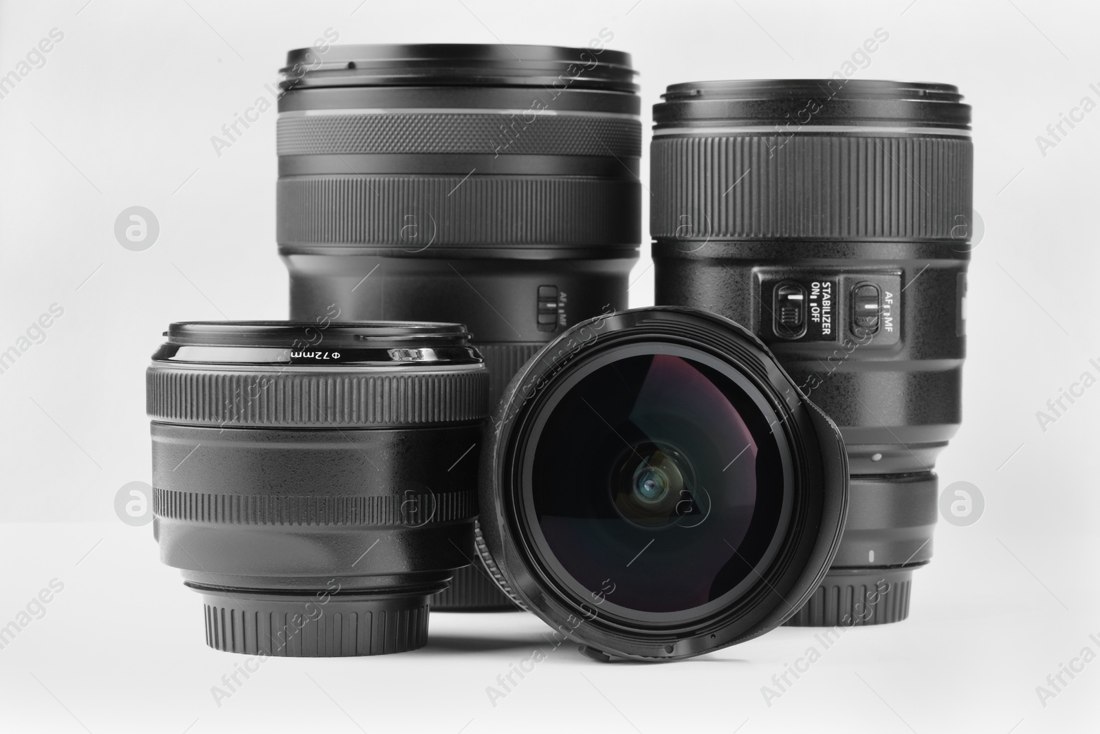 Photo of Camera lens on white background. Photographer's equipment