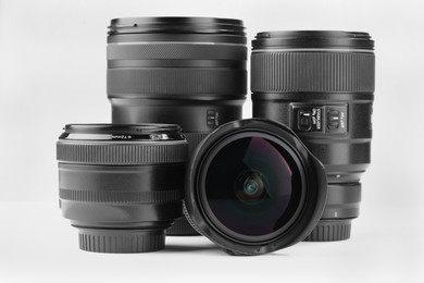 Photo of Camera lens on white background. Photographer's equipment