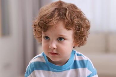 Photo of Portrait of little boy indoors. Cute child