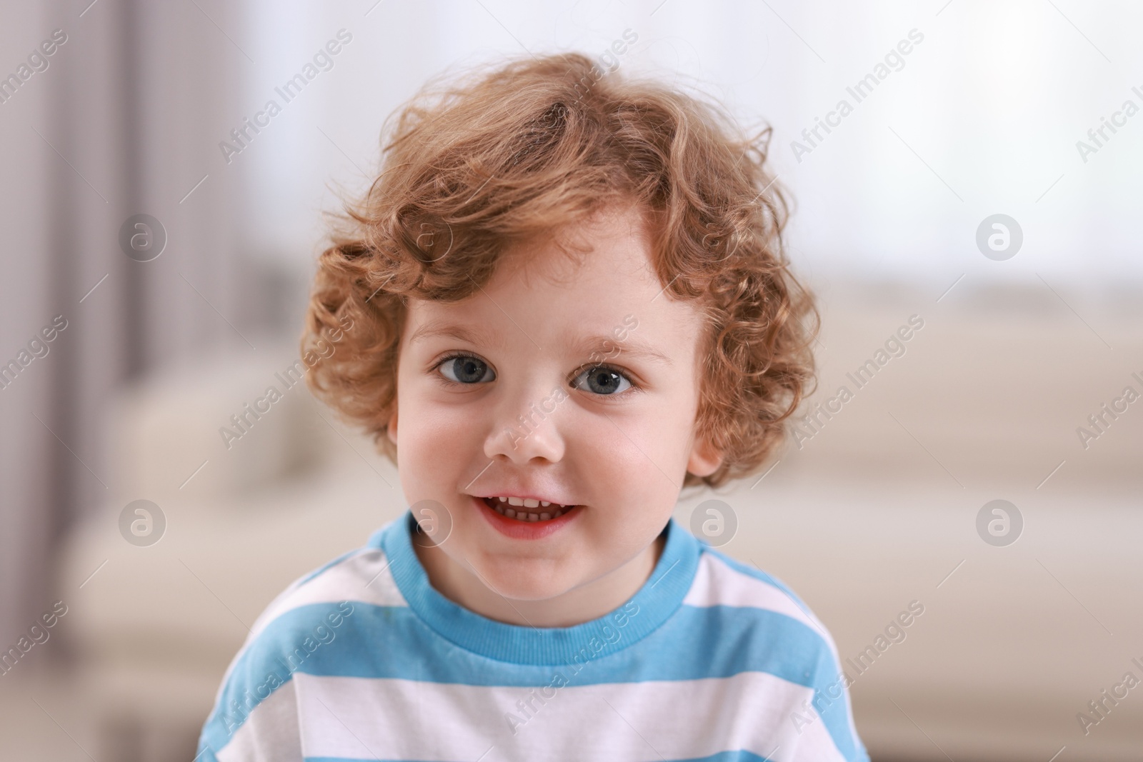 Photo of Portrait of little boy indoors. Cute child