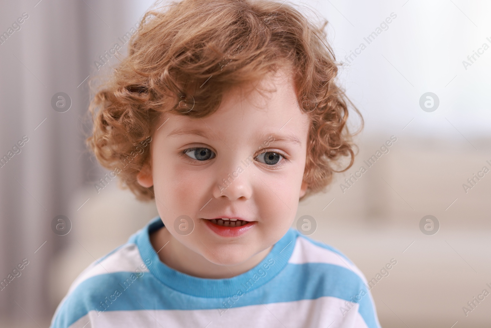 Photo of Portrait of little boy indoors. Cute child