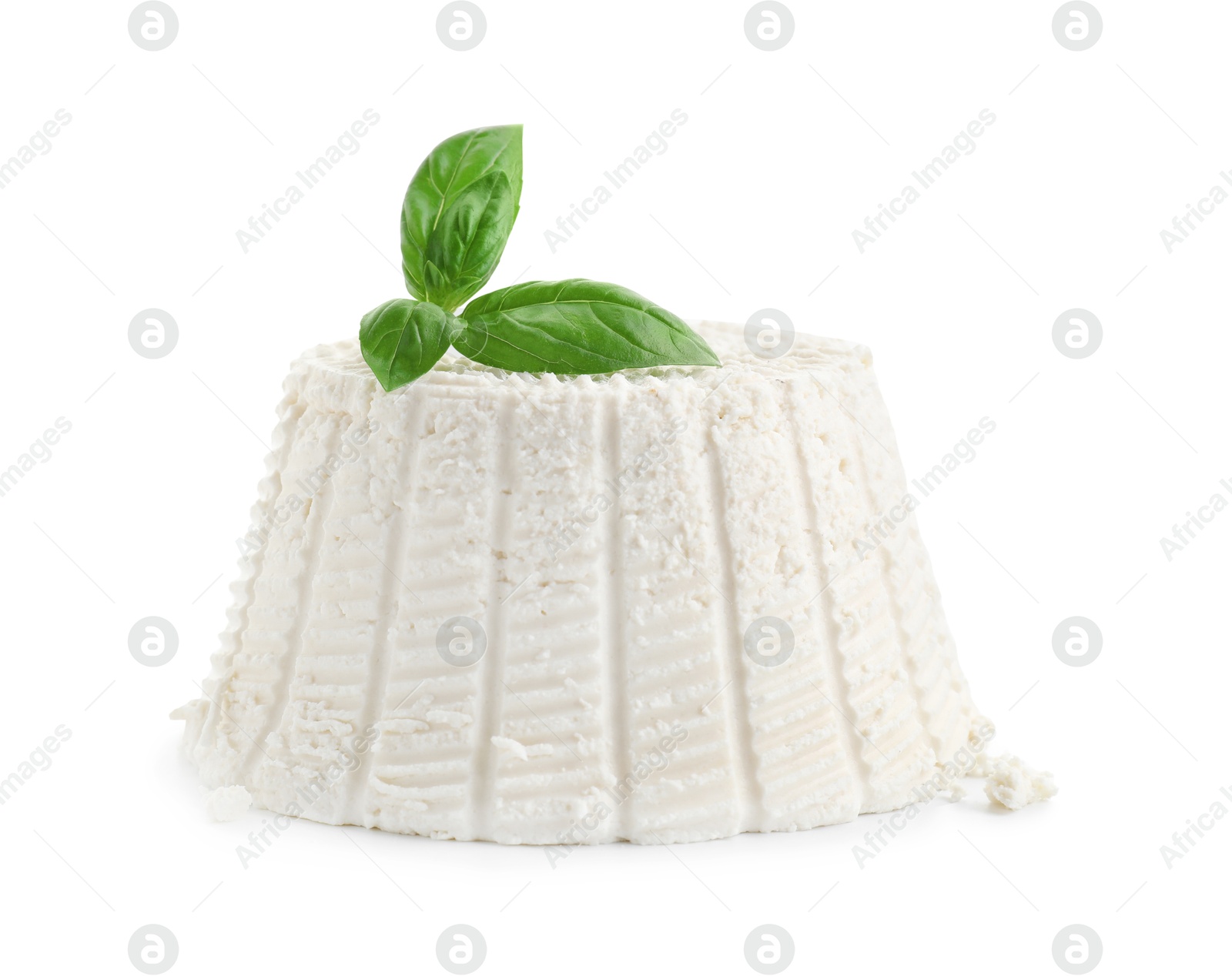 Photo of Fresh ricotta (cream cheese) and basil isolated on white