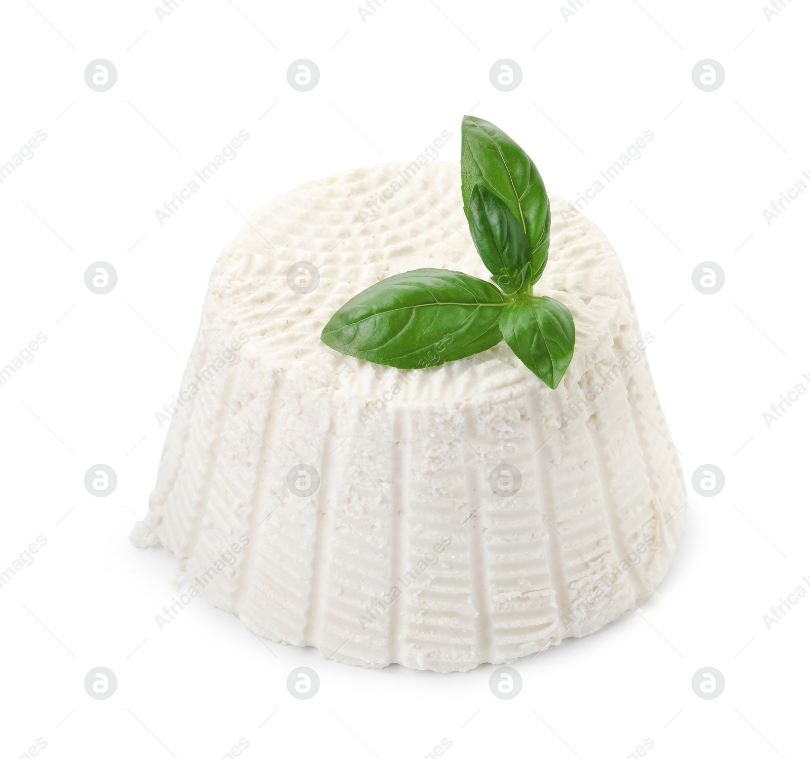 Photo of Fresh ricotta (cream cheese) and basil isolated on white