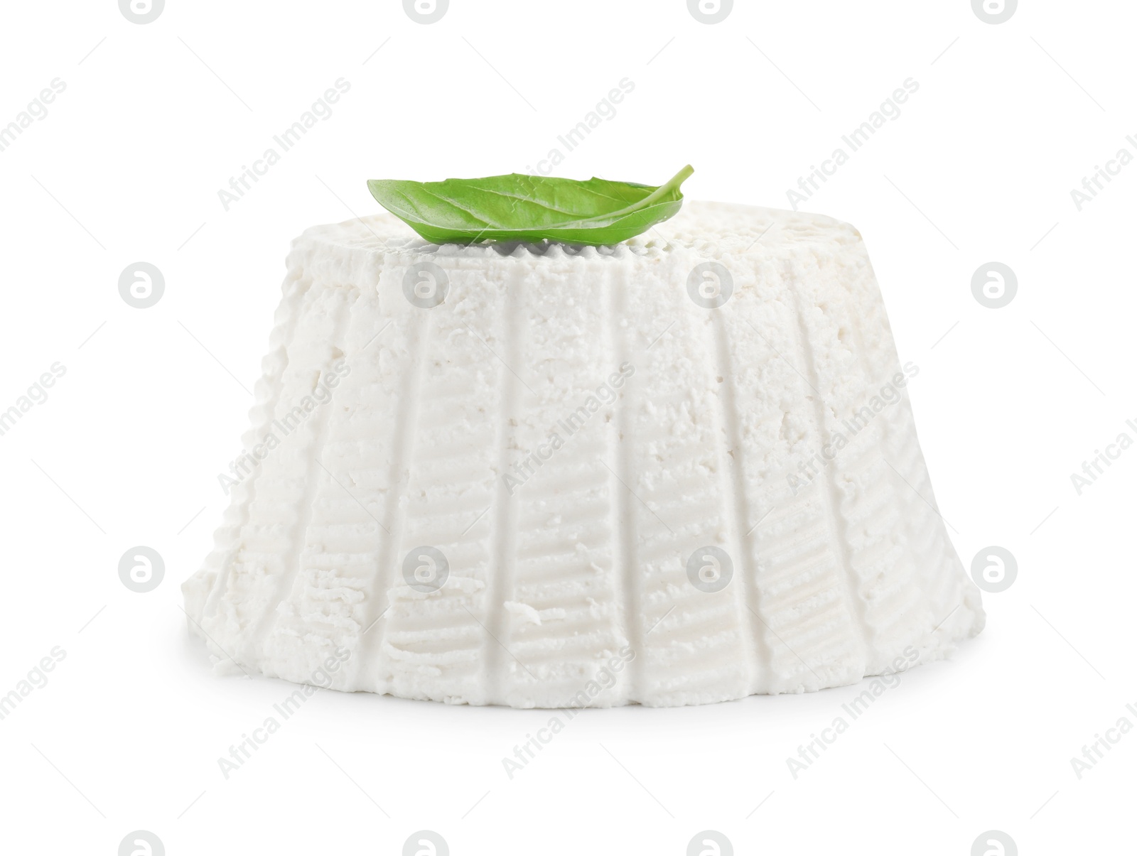 Photo of Fresh ricotta (cream cheese) and basil isolated on white