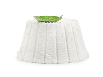 Fresh ricotta (cream cheese) and basil isolated on white