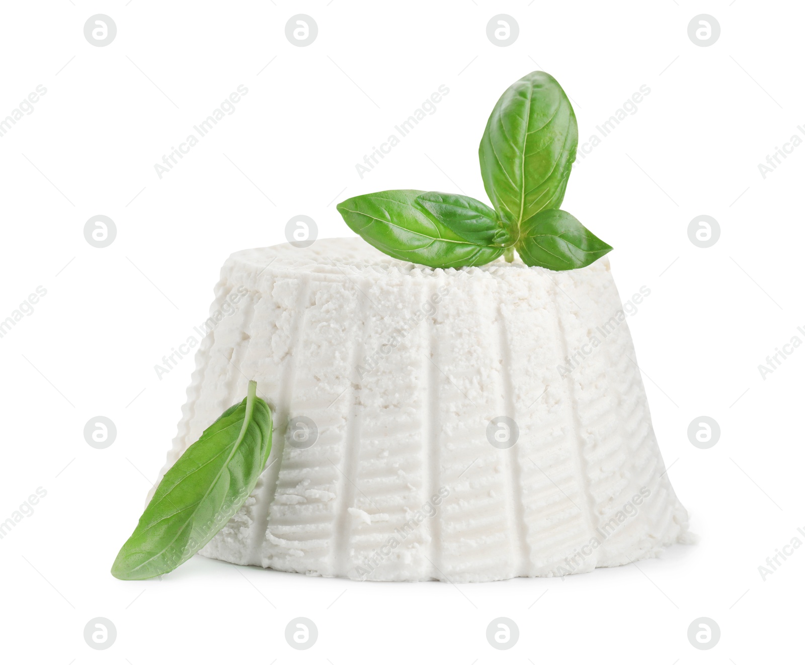 Photo of Fresh ricotta (cream cheese) and basil isolated on white