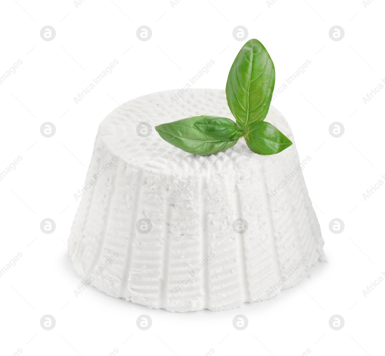 Photo of Fresh ricotta (cream cheese) and basil isolated on white