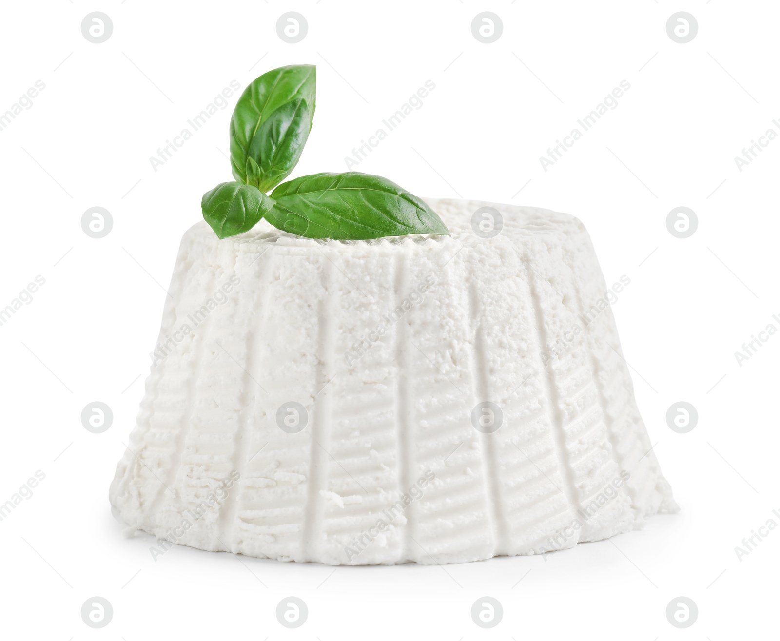 Photo of Fresh ricotta (cream cheese) and basil isolated on white