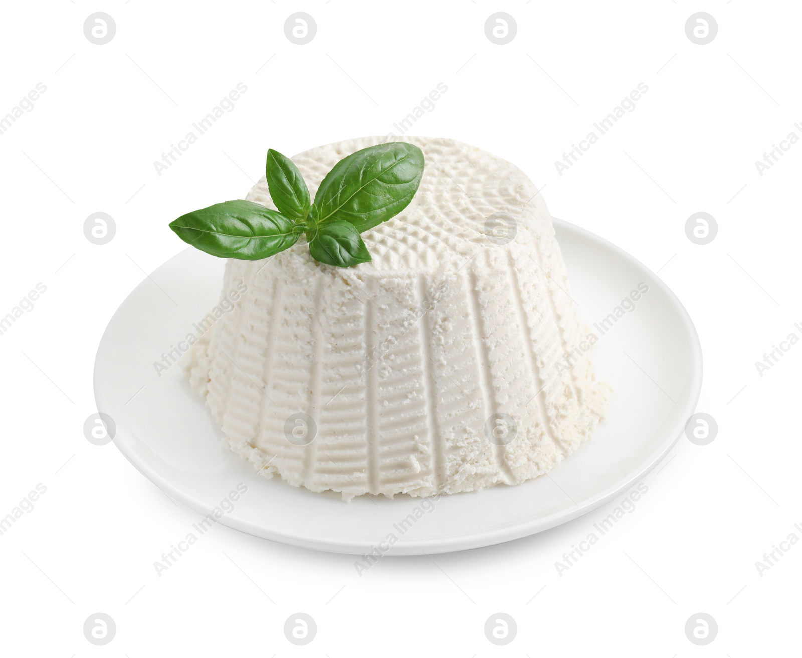 Photo of Fresh ricotta (cream cheese) with basil isolated on white