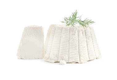 Photo of Fresh cut ricotta (cream cheese) with dill isolated on white