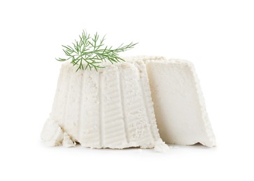 Photo of Fresh cut ricotta (cream cheese) with dill isolated on white