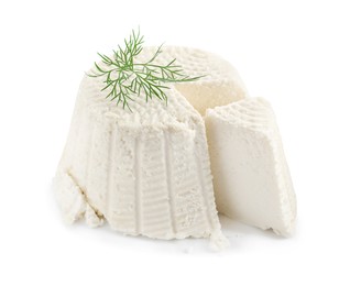 Fresh cut ricotta (cream cheese) with dill isolated on white