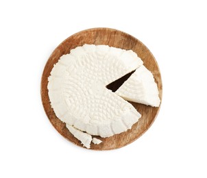 Photo of Fresh cut ricotta (cream cheese) isolated on white, top view