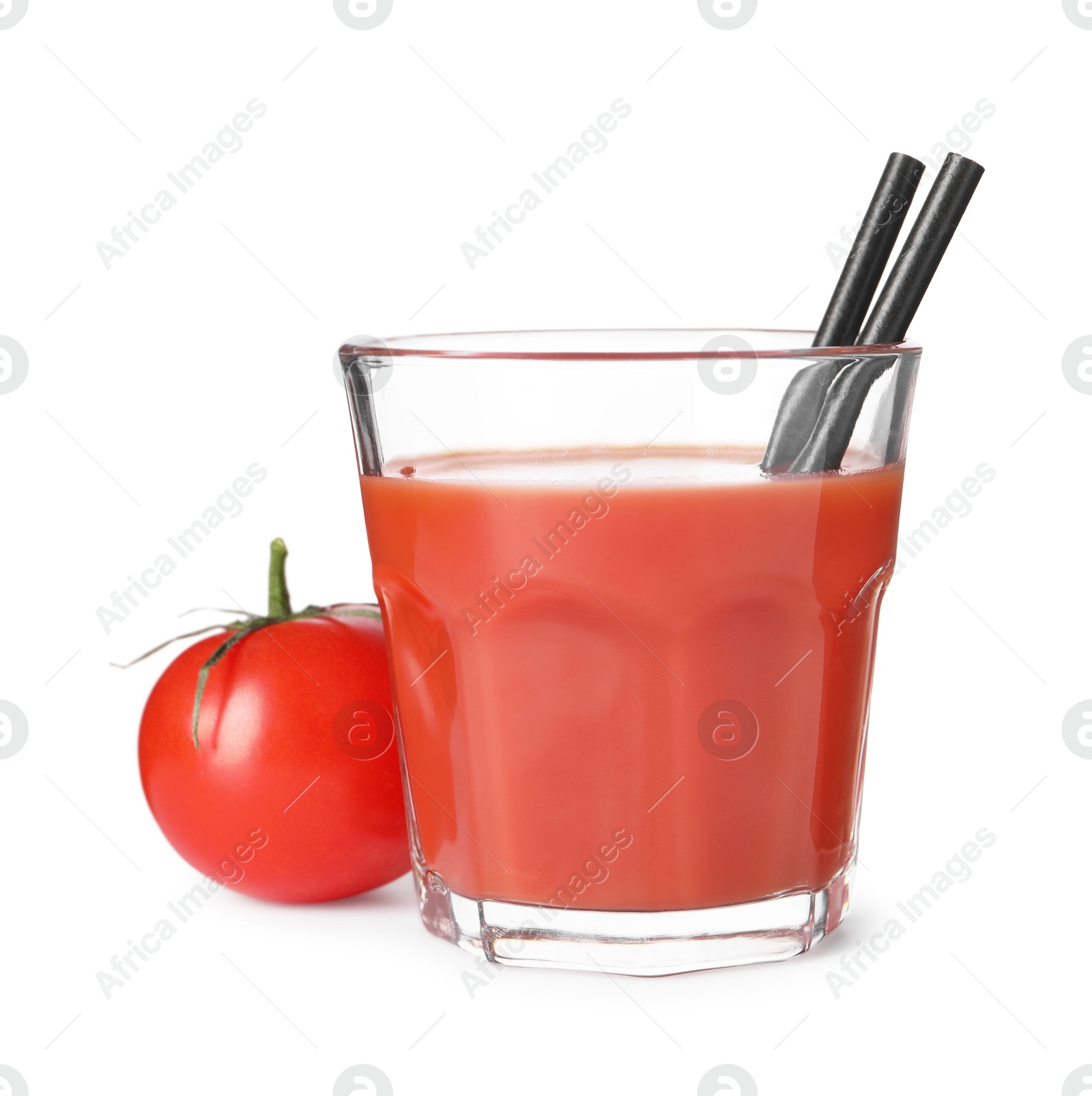 Photo of Tasty tomato juice in glass and fresh vegetable isolated on white