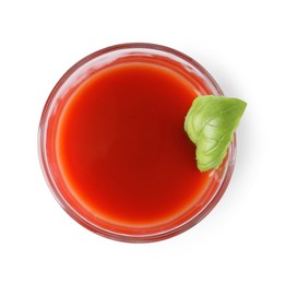 Photo of Tasty tomato juice in glass and basil isolated on white, top view