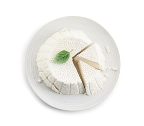 Photo of Tasty ricotta (cream cheese) and basil isolated on white, top view